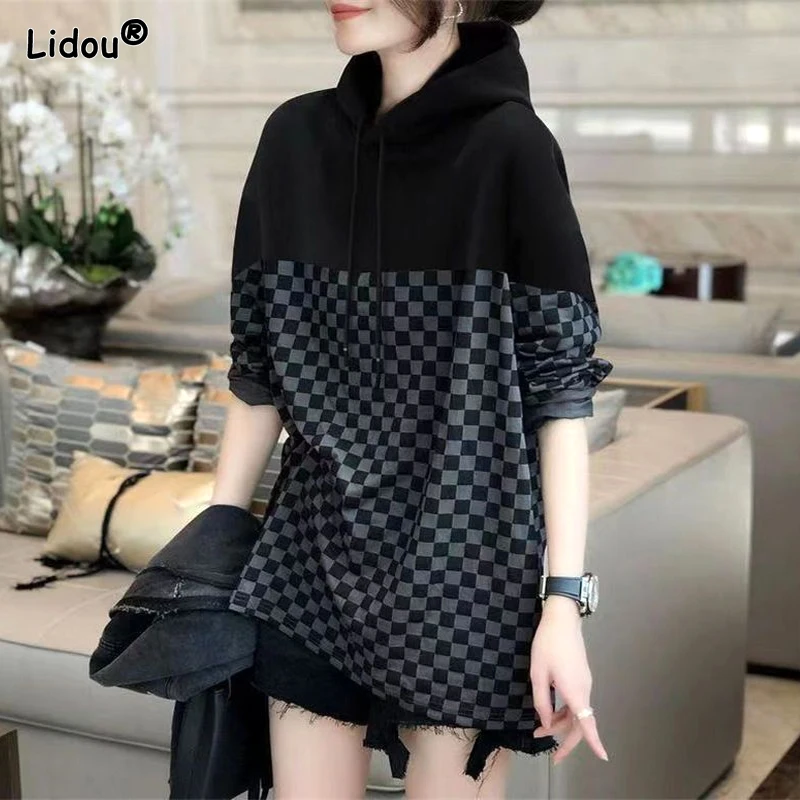 

2023 New Spring and Autumn Fashionable Age Reducing Casual Loose Oversized Hooded Tie Up Plaid Printed Long Sleeved Sweater