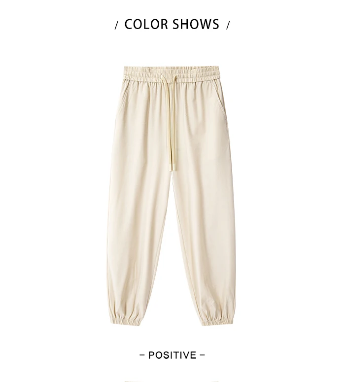 Pantalones casuales para mujer diseñados con un toque de textura. Pantalones cónicos de jacquard con estampado oscuro y un ajuste único y holgado.