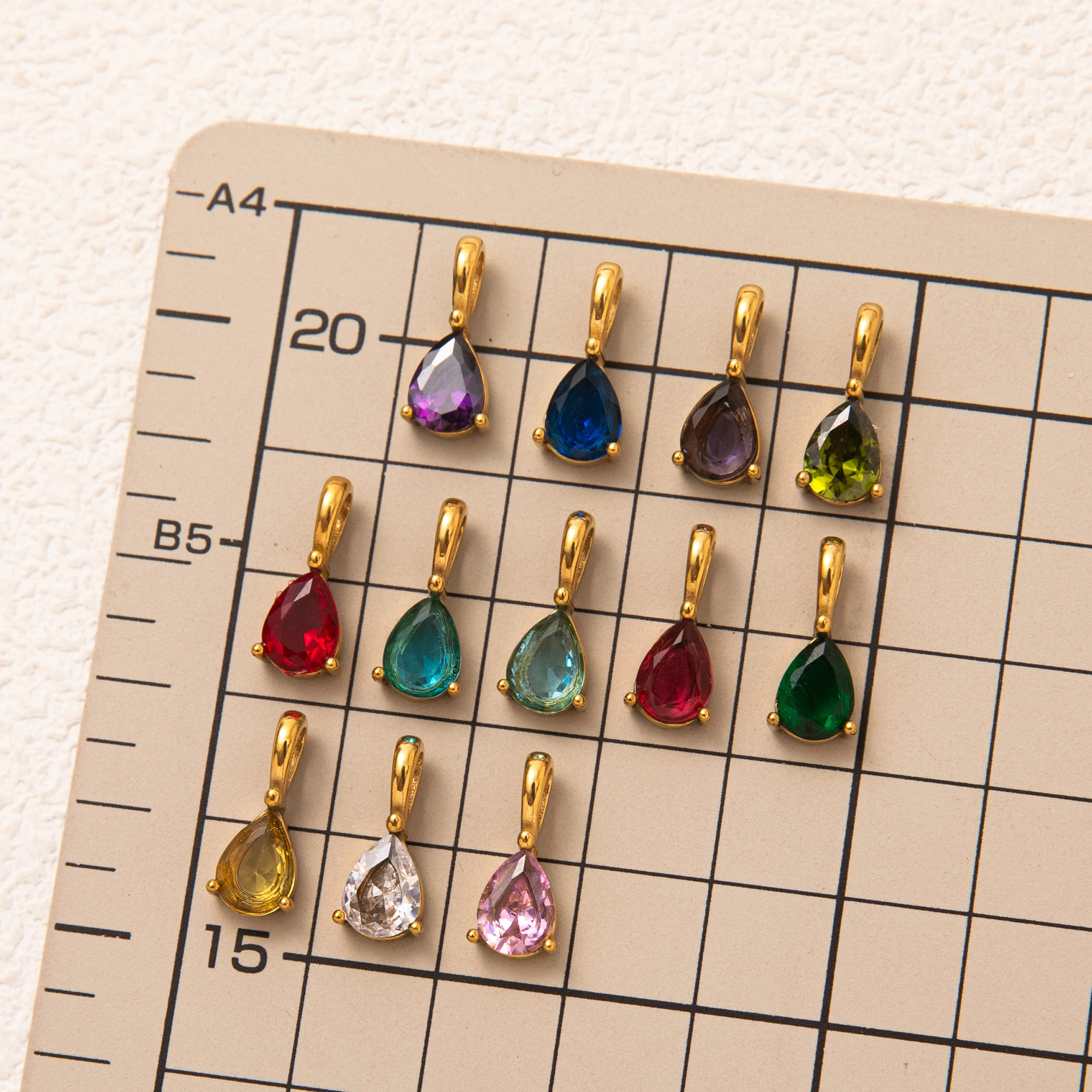 Elegant Water Droplet Pendant in 18K Gold with Birthstone Accent