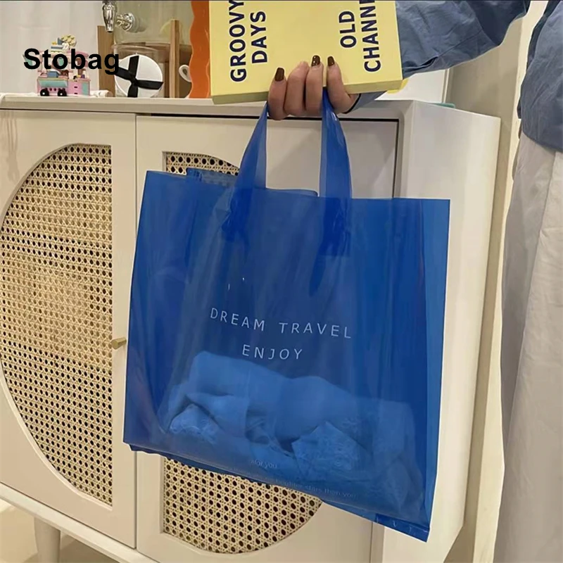 

StoBag 50pcs Transparent Plastic Woman Shopping Shoulder Tote Bags Clothing Gift Packaging Big Portable Reusable Logo Wholesale
