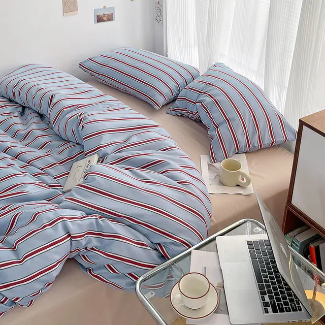 Simple Red and Blue Striped Duvet Cover and Four Piece Bed Sheet Set with Washed Cotton Bedding on the Bed 2