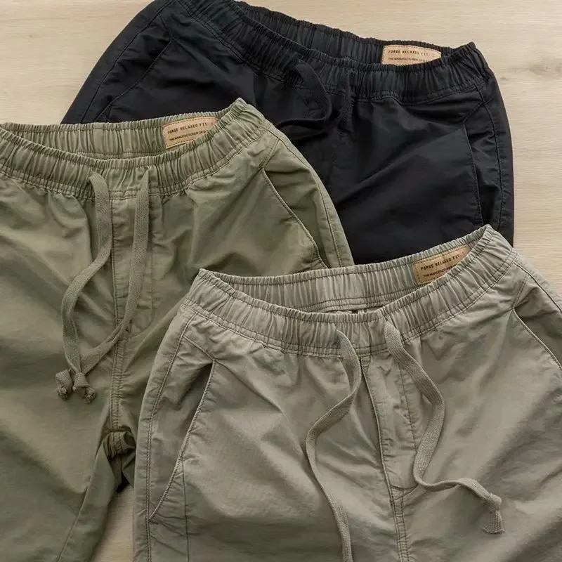 Pantalones cortos duraderos para hombre, pantalones de protección laboral de algodón holgados, ropa de trabajo de estilo informal, novedad de 2022