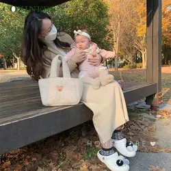 Bolso para mamá de lana de cordero de Color sólido, bolso multifuncional de moda para mamá, bolso ligero para pañales de gran capacidad, súper suave