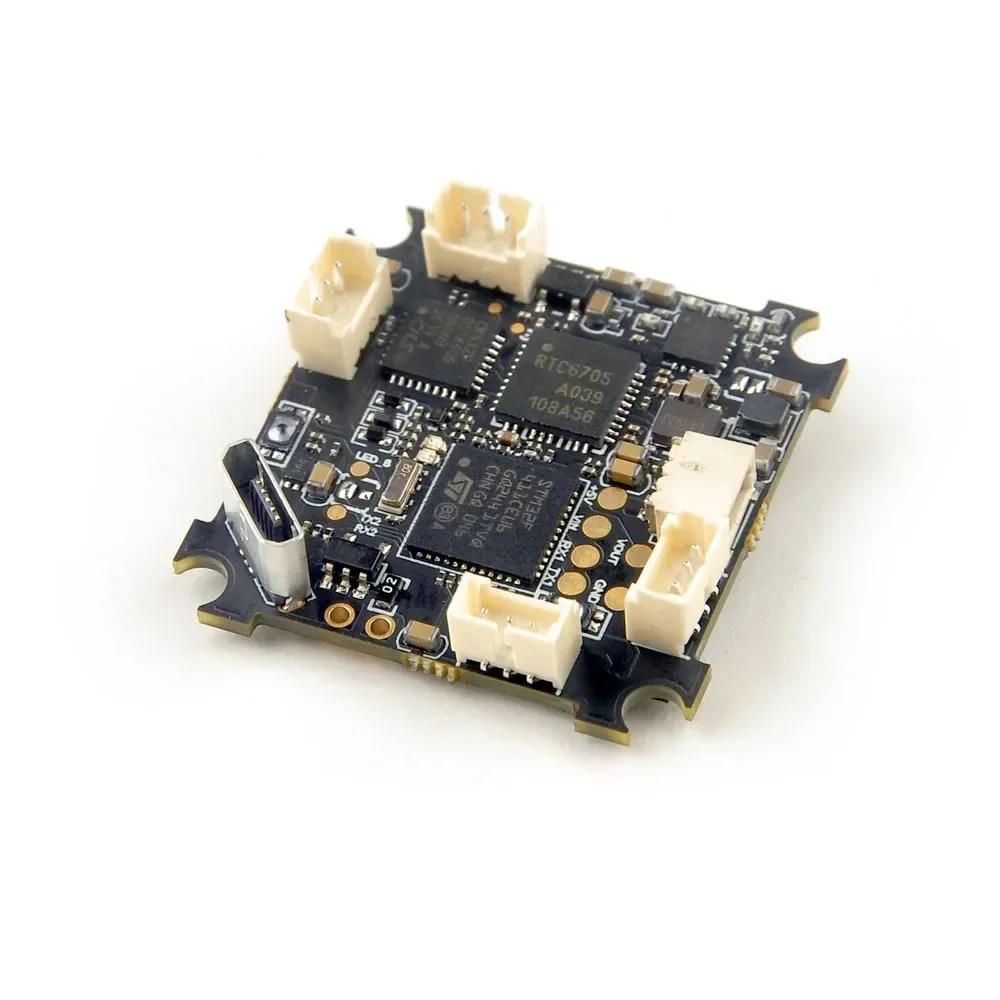 Vue de dessus du contrôleur de vol AIO F4 5 en 1 avec récepteur ExpressLRS SPI 2.4GHz et VTX 400mW, détails des composants.