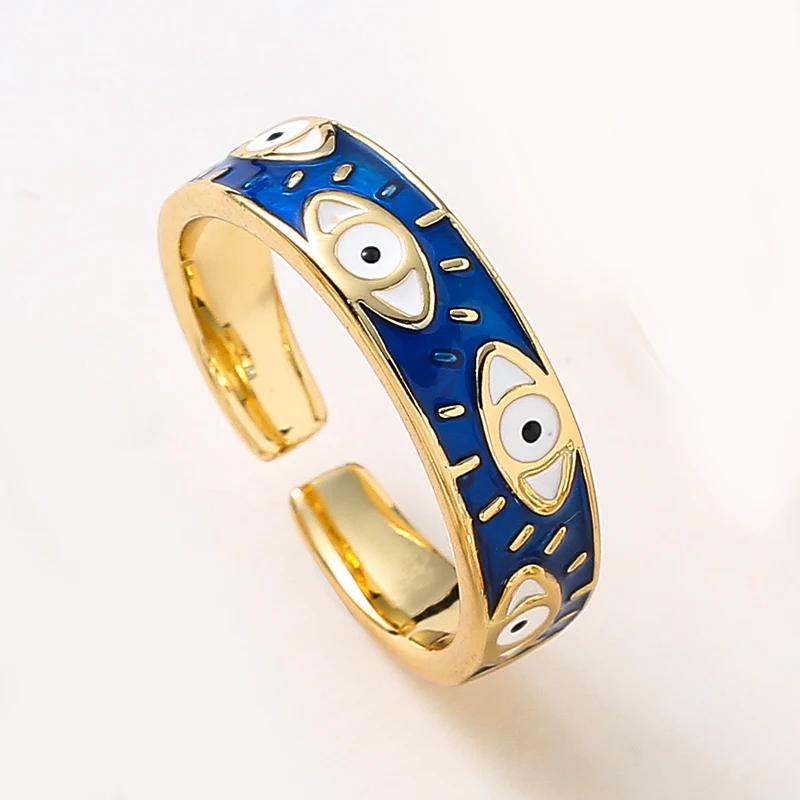 Anel dourado e azul escuro