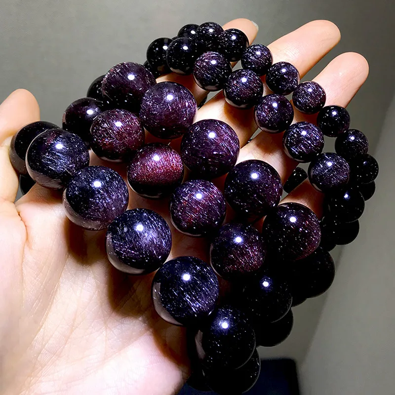 Natural red, black, and purple super seven color bracelets with top-notch crystal scattered beads are worth collecting