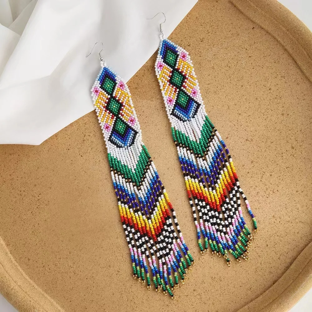 

Rice bead earrings Tassel Geometry Design Wavy Arrow Hand knitting Bohemia Alloy Fashion Simple Beaded earrings