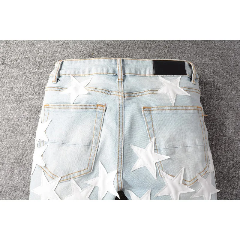 Best Sellers Men\'s Distressed Streetwear Light Blue Denim Pants Leather White Stars Patchwork Moustache Holes Ripped Jeans Pants