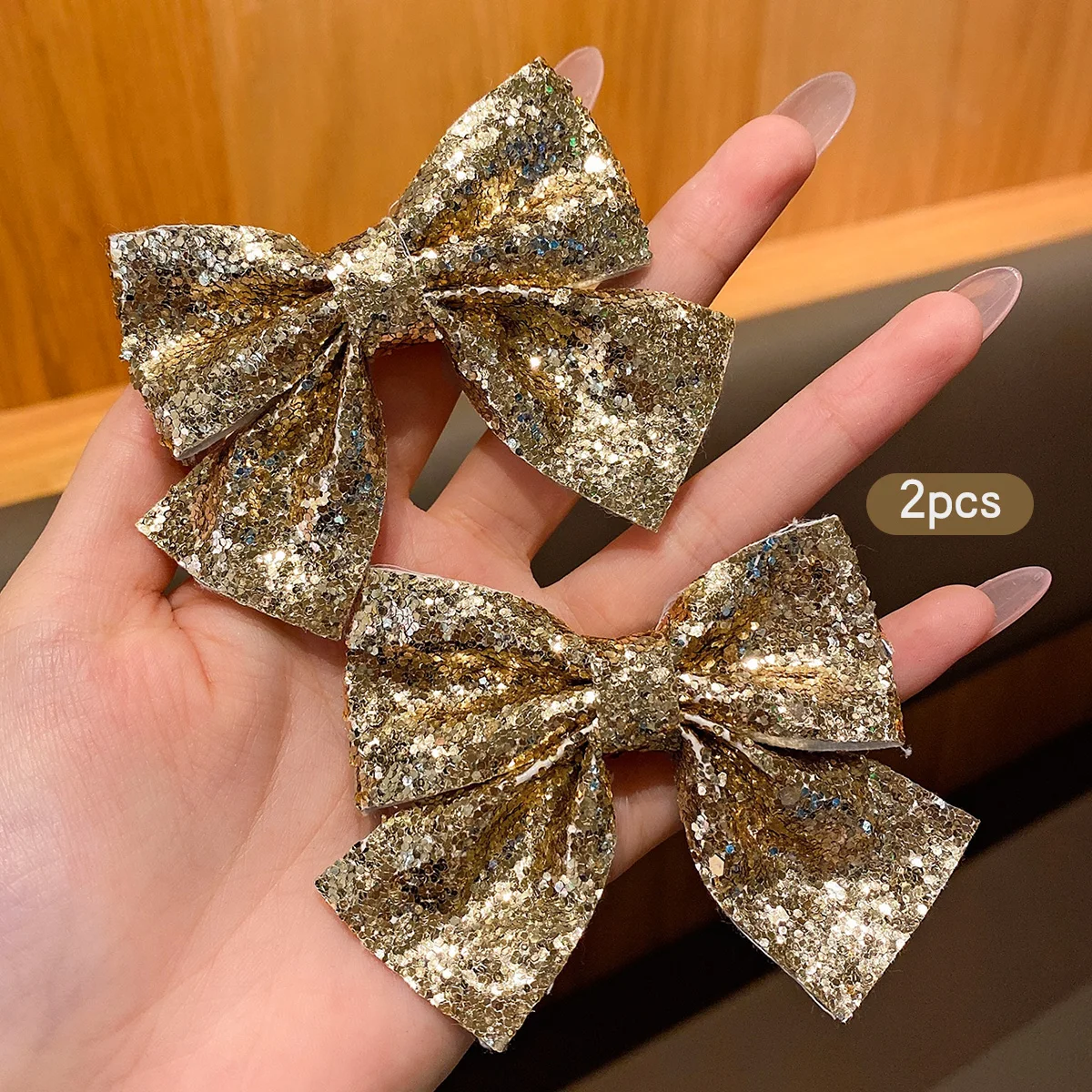 2 goldene Haarspangen mit Schleife, modisch, süß und niedlich, geeignet für den täglichen Gebrauch als Haarschmuck