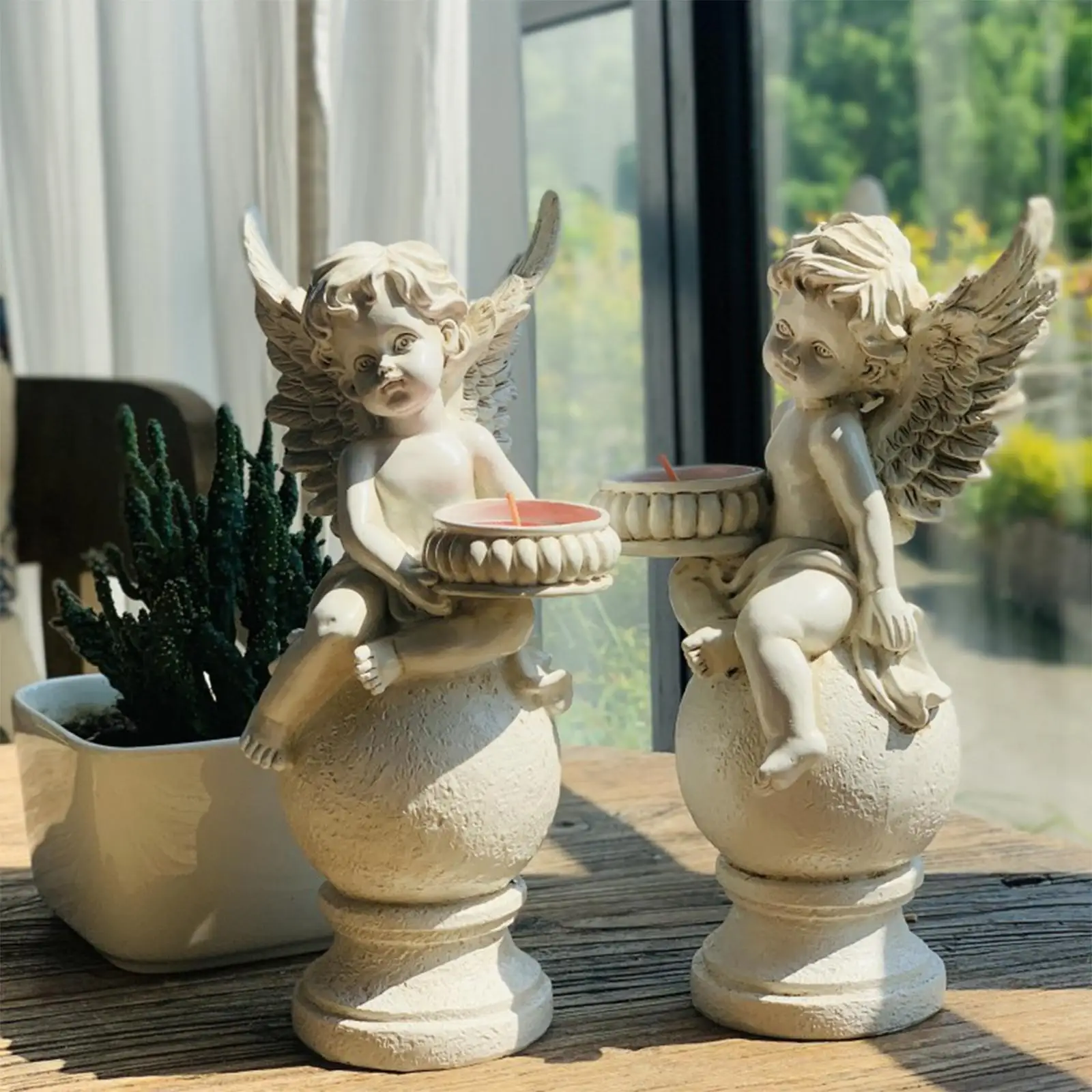Engel figuur putte speelt fluit 22 cm | decoratieve engeltjes