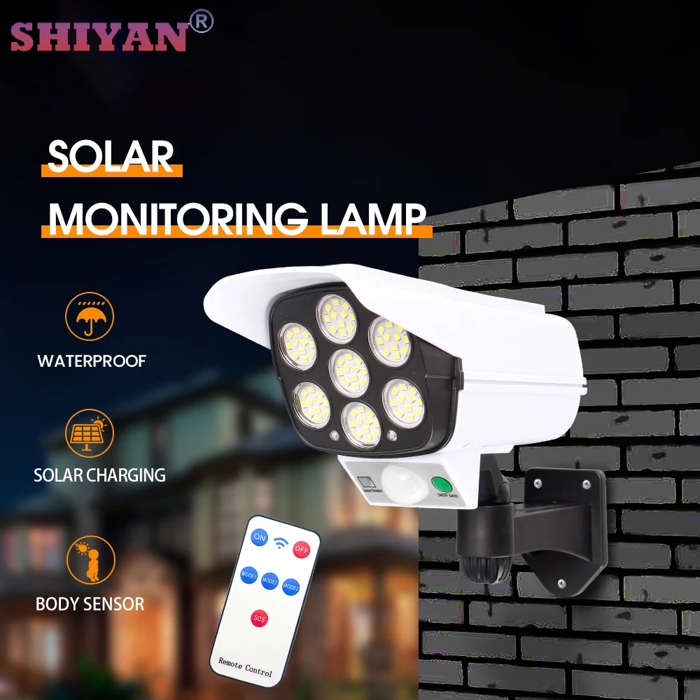 

Настенный светильник SHIYAN на солнечной батарее в форме камеры с дистанционным управлением, 77 бусин, лампа наружного наблюдения с защитой от кражи, уличная лампа