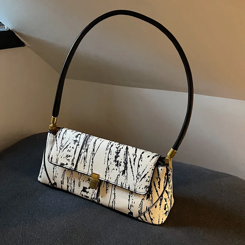 Retro high-quality underarm bag women's bag 2023 new French niche shoulder bag versatile fashion baguette bag