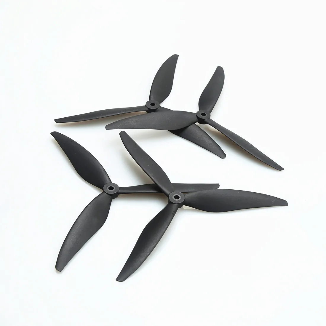 Lot de 4 hélices pour drone FPV course, angle montrant l'épaisseur et le profil aérodynamique.