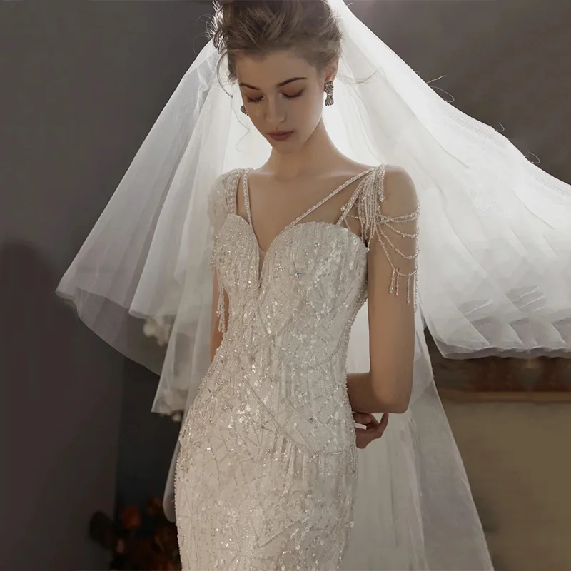

Women Fairy Spaghetti Strap Prom Dresses Sexy White Long Mermaid Wedding Dress Formal Sequins Beading Party Gowns
