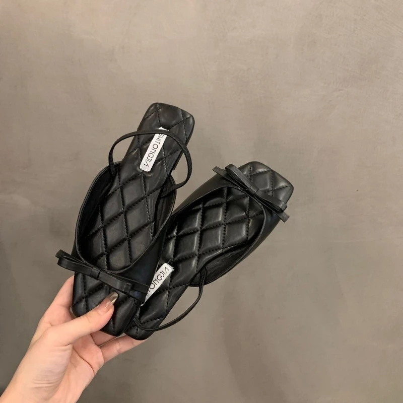 2024 new niche French black open-toed sandals for women summer bow soft soled beach Roman shoes