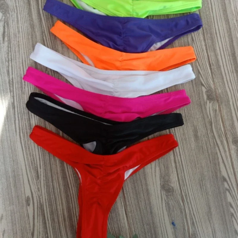 

Hot Sale New Fashion Ladies Thong Swim Trunks Multiple Colors Solid Color Pleated Thong Swimwear Women Bikini Swim Trunks