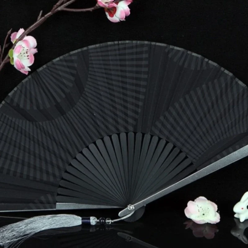 

Titanium alloy fan, boy's weapon, iron fan, pure metal self-defense weapon fan, metal folding fan, aluminum alloy material