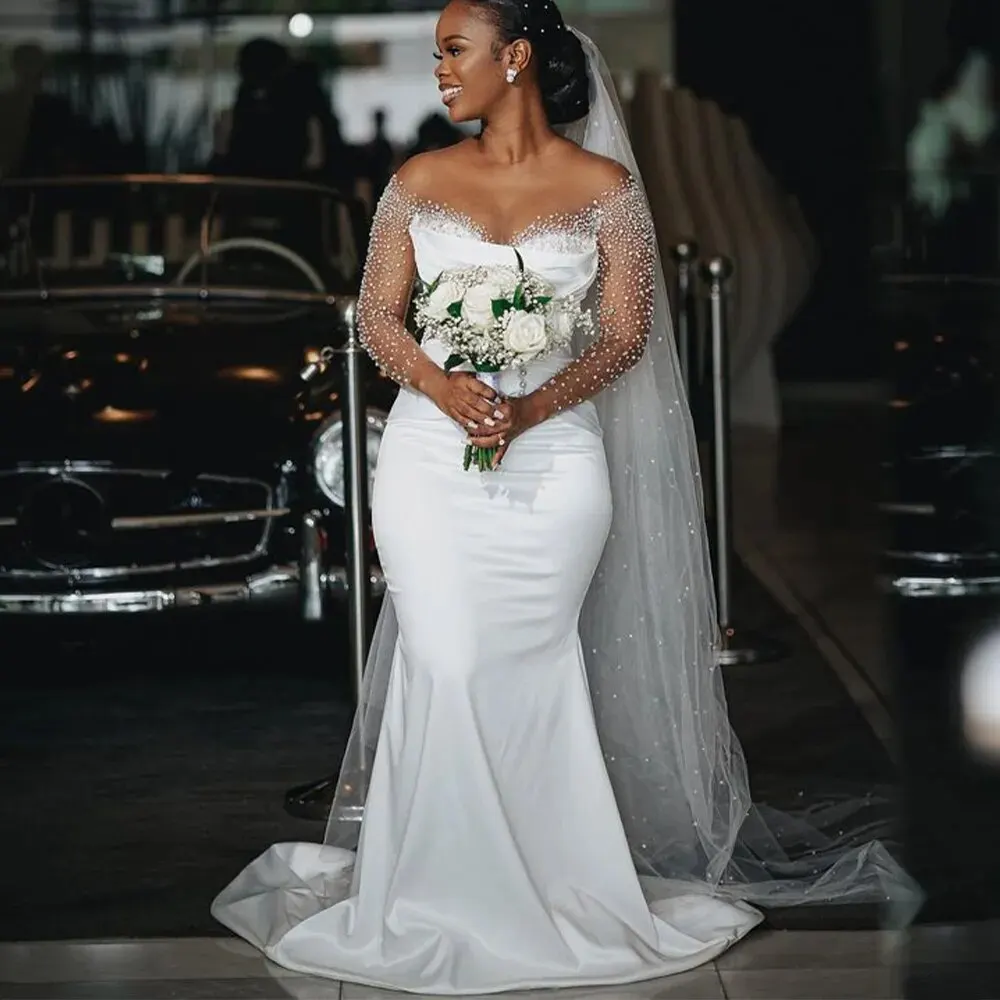 

Africa Mermaid Wedding Dresses with Detachable Train 2023 Sheer Neck Long Sleeve Beading Pearls Arabic Bridal Gowns
