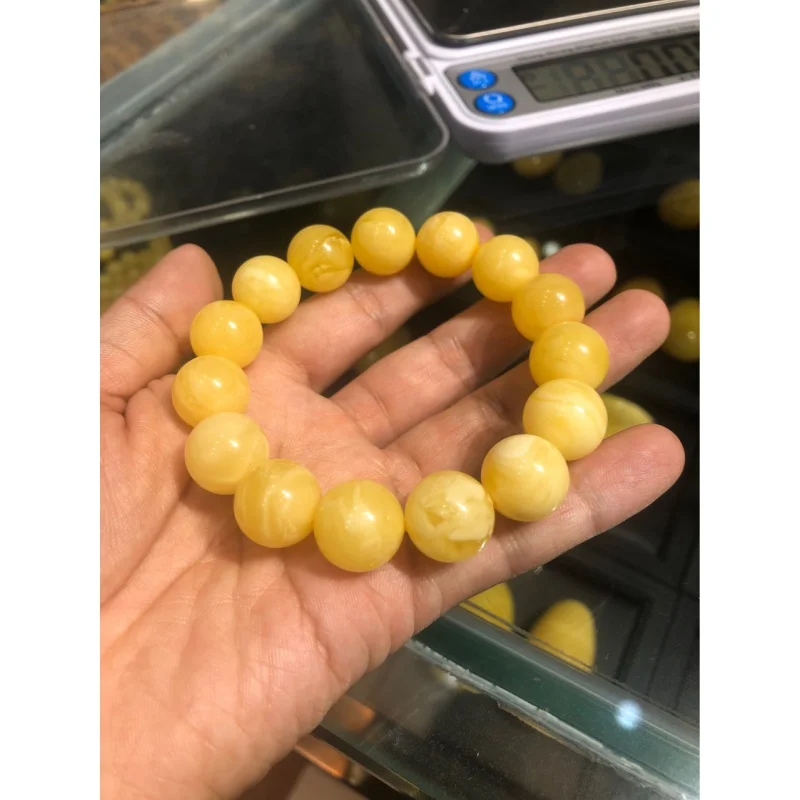 

Genuine Natural Amber Beeswax Men's and Women's Yellow Chicken Grease round Beads Single Ring Bracelet with Certificate