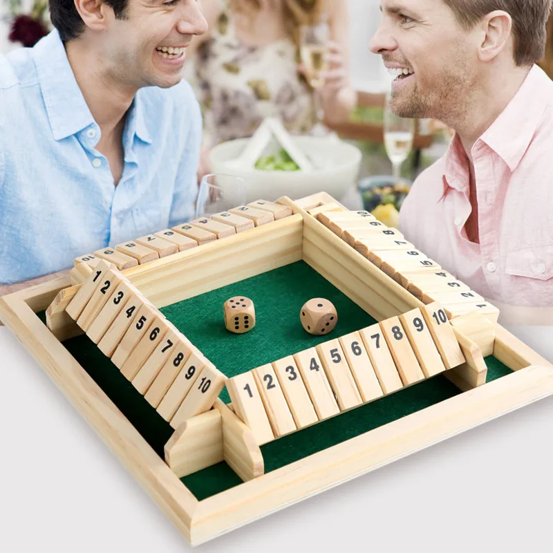

Доска с надписью «Shut The Box», 10 чисел