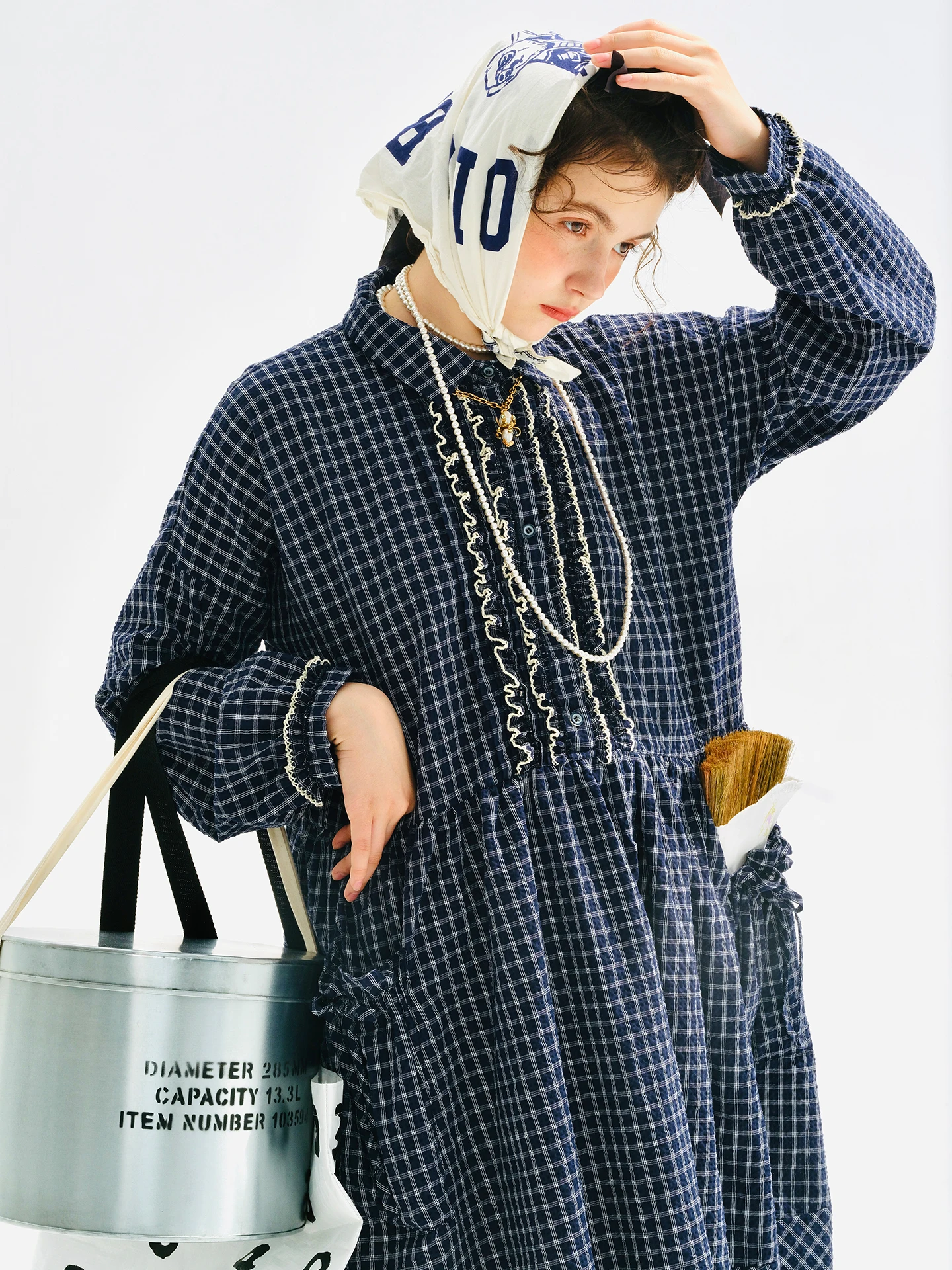 blue gingham peter pan collar dress Bamboo Peter Pan Collar Dress in Gingham Thistle by Kyte Baby main image 0