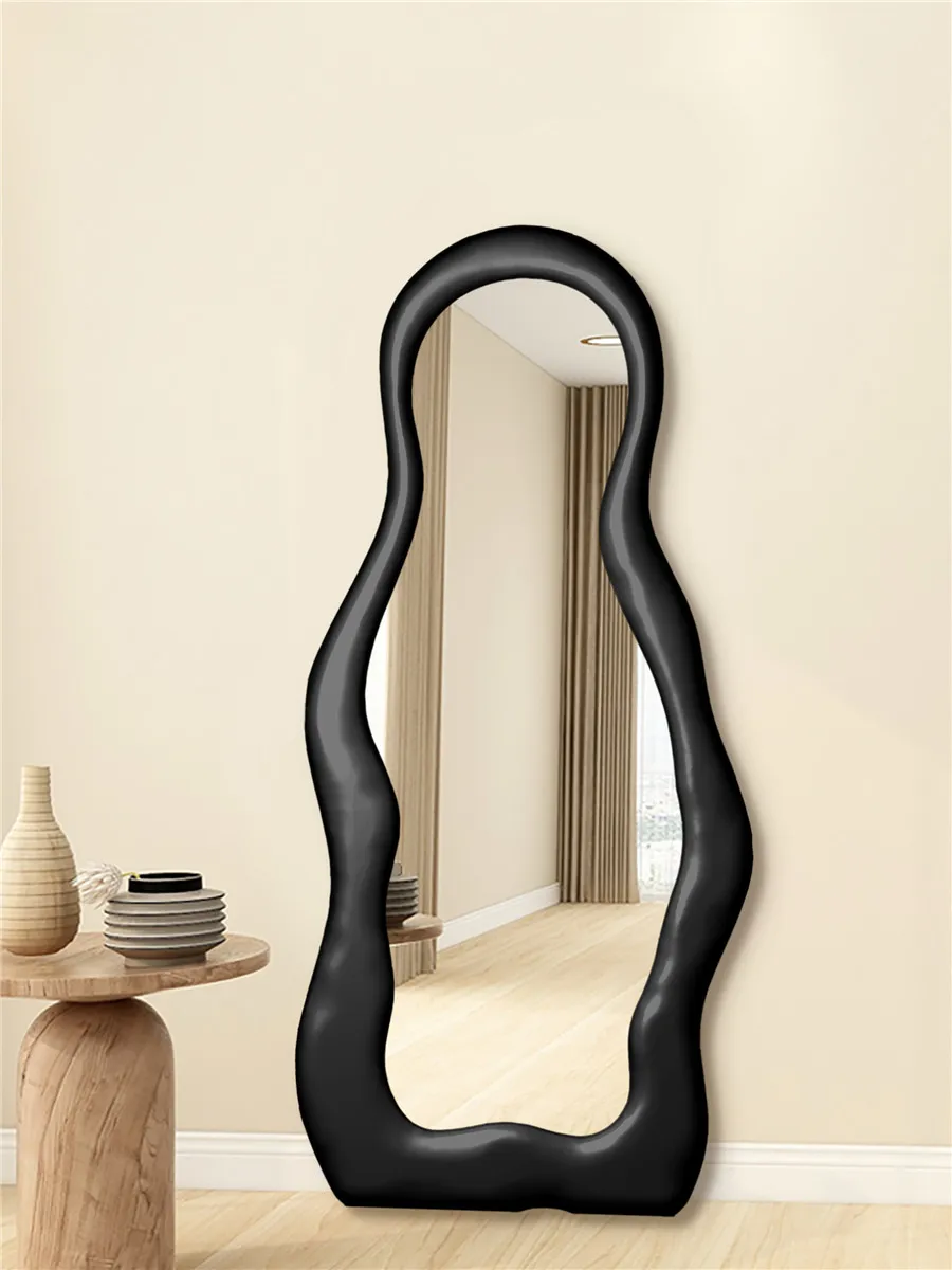 

Floor to ceiling full-length dressing mirror for irregular home use, artistic wall mounted wooden fitting mirror against the wal