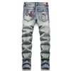 Men Badge Patch Denim Jeans Embroidery Patchwork Ripped Distressed Pants Slim Tapered Stretch Trousers 2