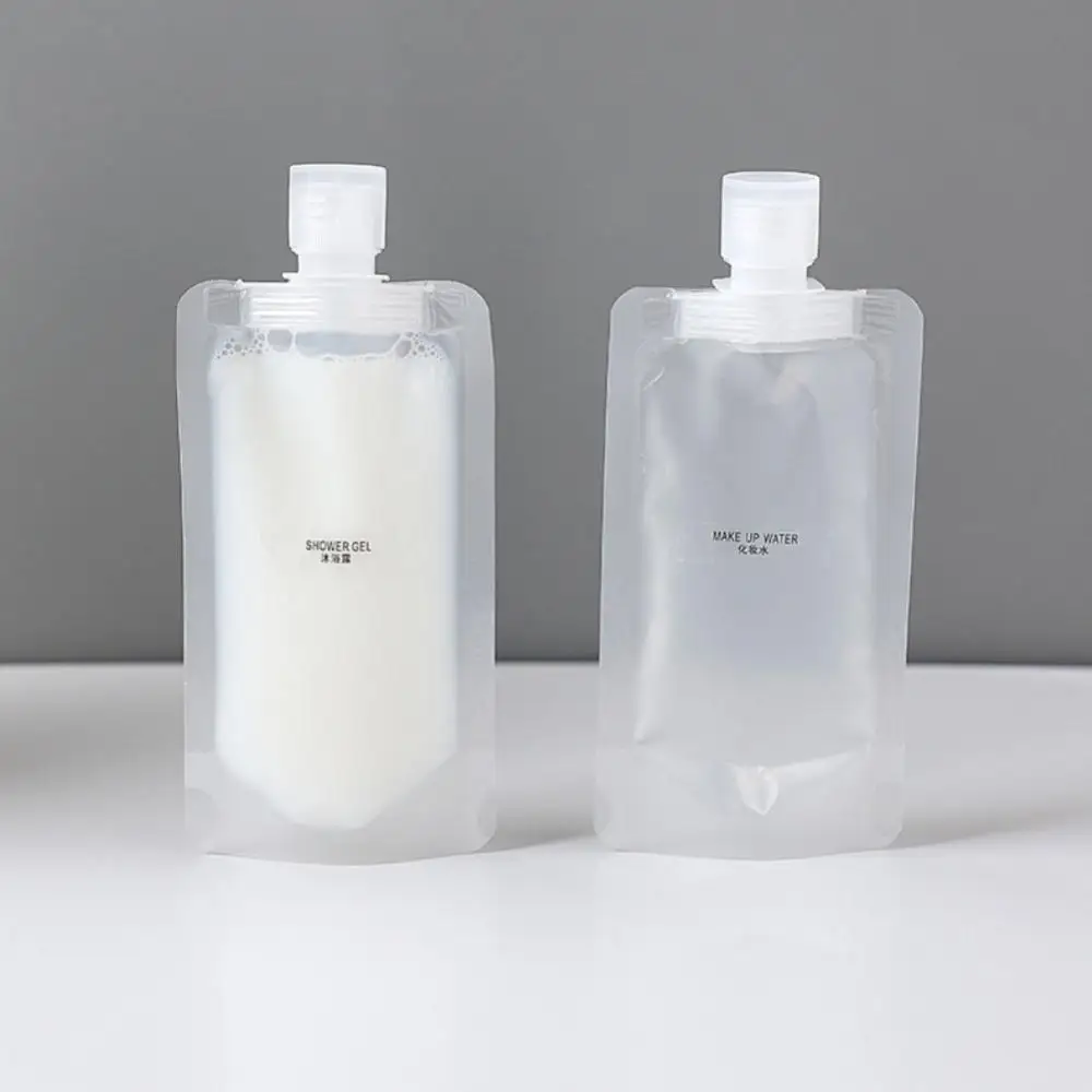 

5/10pcs Transparent Flip Cap Packaging Bag Portable Plastic Stand Up Spout Pouch Travel Fluid Makeup Packing Bag 30ml 50ml 100ml