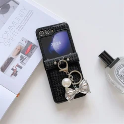 Elegant Silk Thread Texture Leather Phone Case with Gold Bowknot Pendants - Hard Hinge Protector for Galaxy Z Flip 6 (Black)