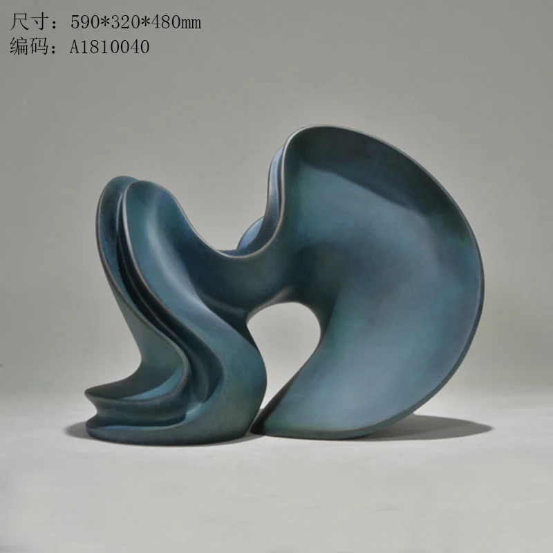 

Cyan simple abstract art sculpture. Modern home accessories.