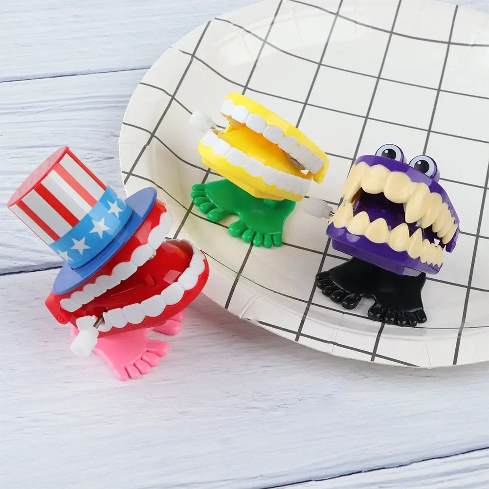 

Funny Chattering Jumping Clockwork Toy Mini Children Christmas Toys Gifts