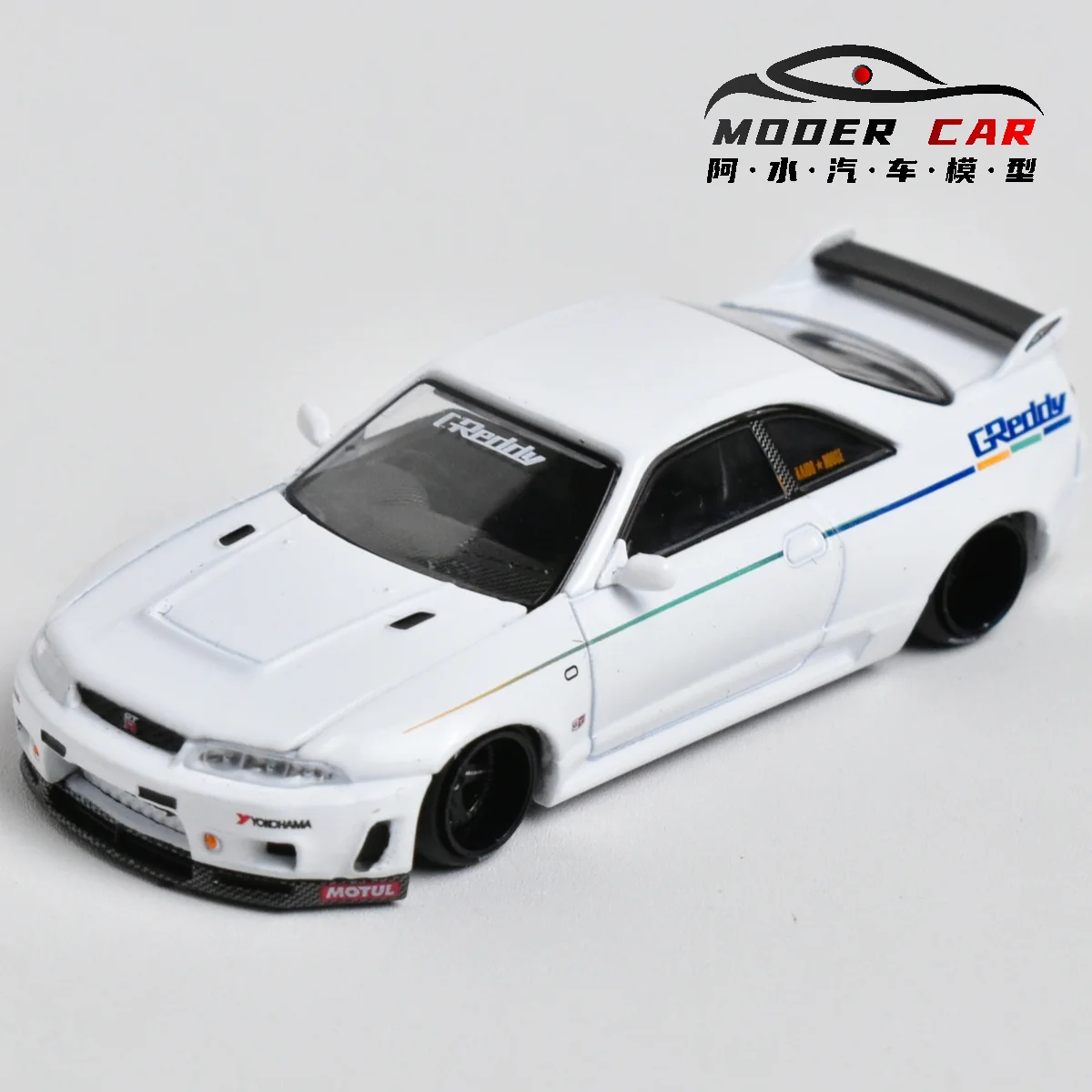

Литые модели автомобилей Kaido House + MINIGT 1:64 GTR R33 GREDDY