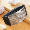 Multi-Use Stainless Garlic & Veggie Press 4