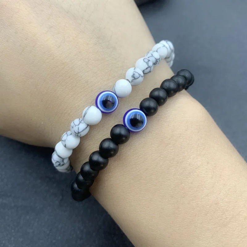 Detailed view of the classic stone beaded couple bracelets jewelry.