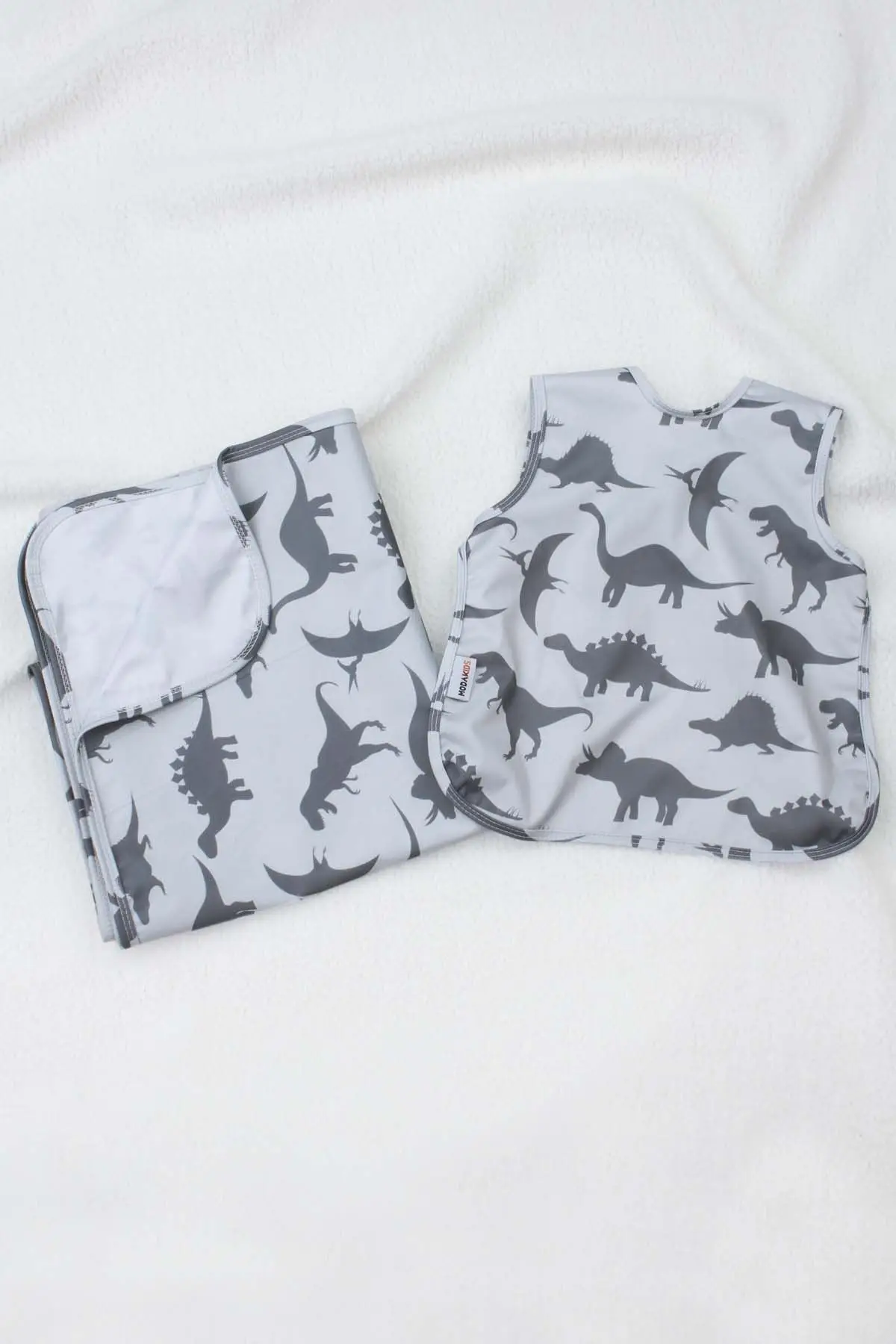 

Modakids Dino Pattern Fluid Bib and High Chair Cover