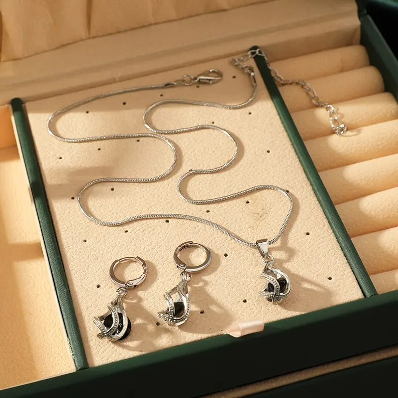 S7d3e34428db442afba1c0215df4a9e86T 3pcs Necklace Earring Set Ladies Light Luxury Wind Copper Alloy Pendant Black Crystal Stone Ear Clip Section Combination Jewelry Mallzona