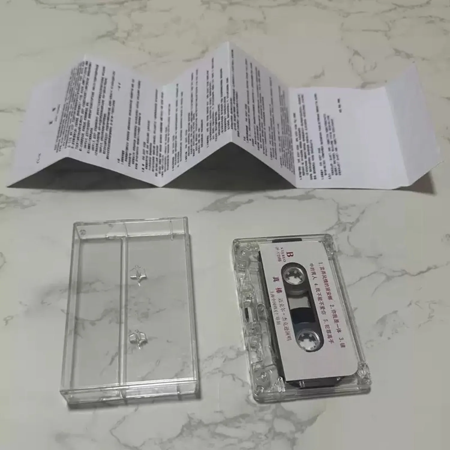 Vintage Cassette Tape with Iconic 80s Dance-Pop Tracks, Black Studded Portrait Cover Art