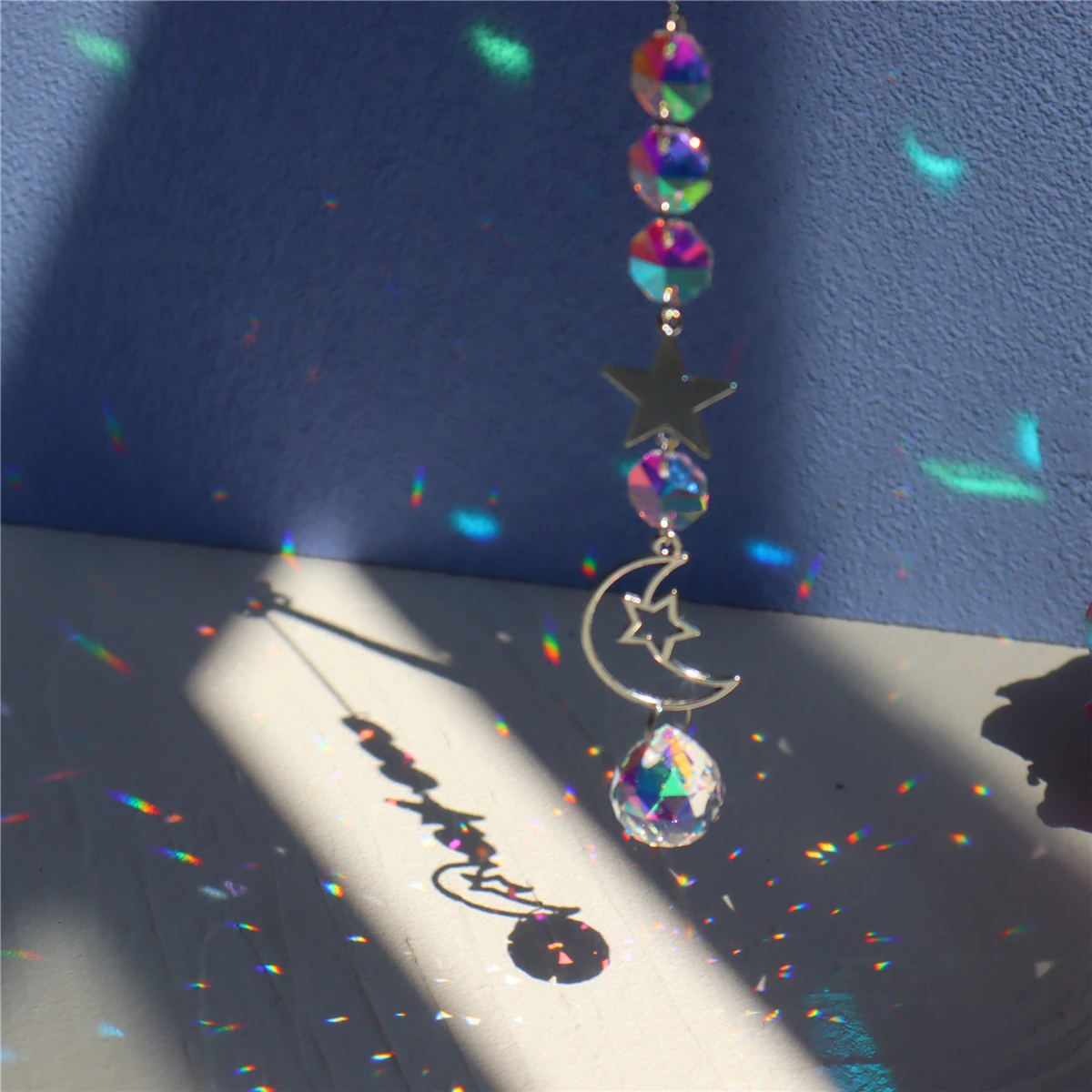 Description Picture 3 of itemCrystal Wind Chime Sun Catchers Ornament Star Moon Pendant Window Hanging Curtain Windchime Rainbow Chaser Home Garden Decor