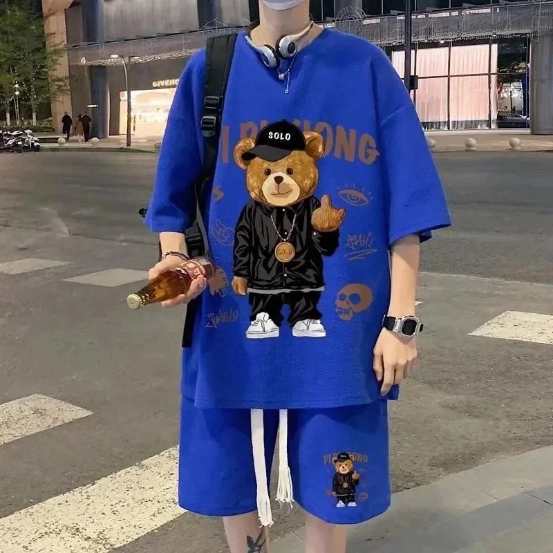 thumbnail image 1 of Conjunto de 2 piezas de chándal sencillo con diseño de gofre para hombre y mujer, camiseta y pantalones cortos de diseño urbano holgados de verano, ropa deportiva informal con diseño de parche, 1 of 5