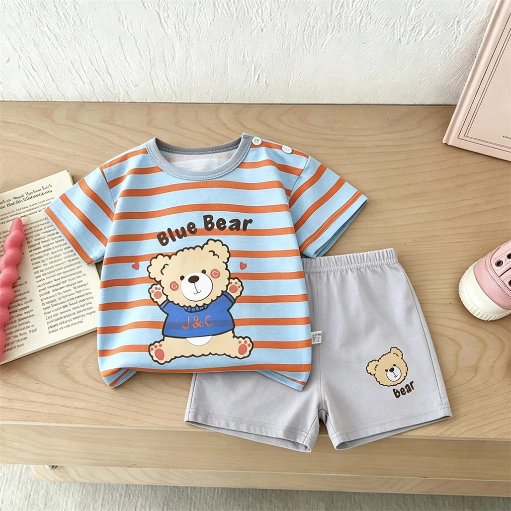 A printed shirt with a small cute bear and matching shorts