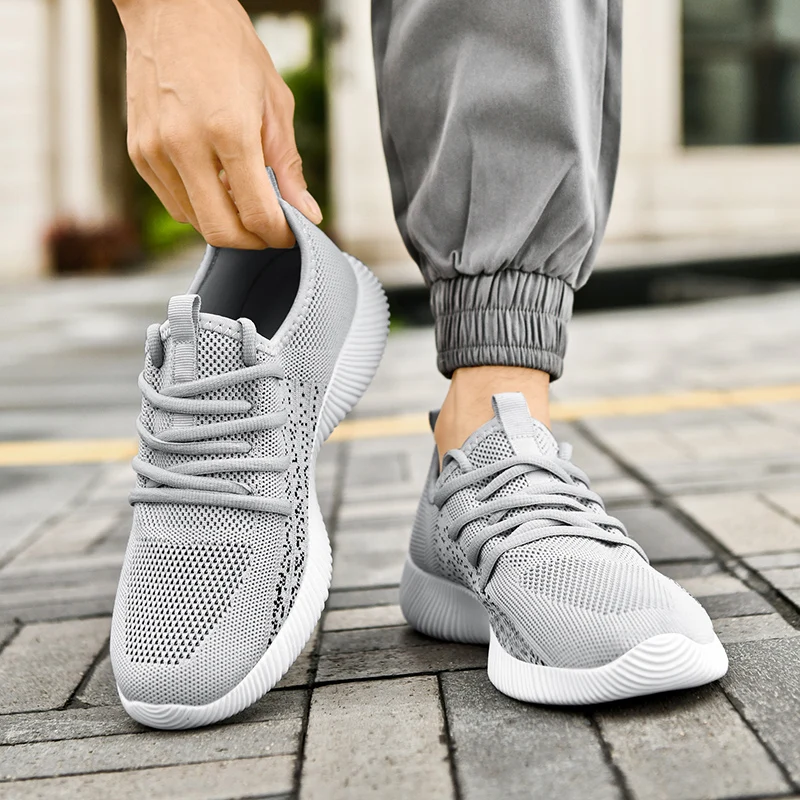 2024 Spring and Autumn mesh surface breathable running casual sneakers for men Flat lace-up light walking shoes for men