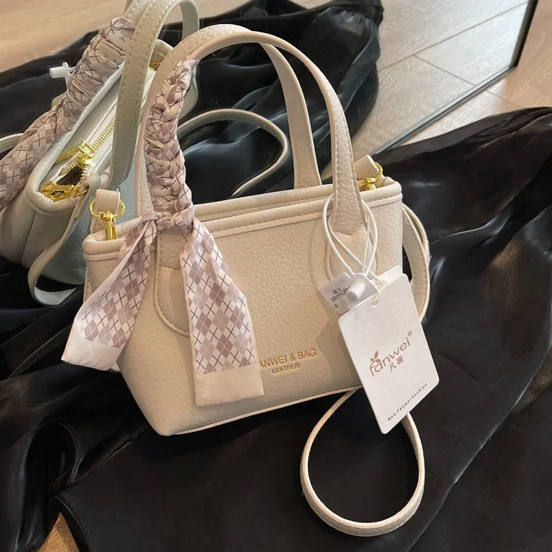 This Summer Popular 2024 New Solid Color Textured Handbag High Sense Cross Body Bucket Women's Bag