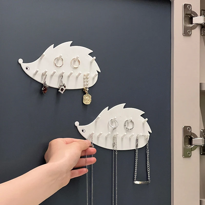 

Cute Hedgehog Shape Sticky Hook Multifunctional Jewelry Hanger Wall Mounted Perforated Storage Cabinet Key Necklace Storage Rack