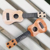 Mini Guitar 4 Strings Classical Ukulele Guitar Toy Musical Instruments for Kids Children Beginners Early Education Small Guitar 4