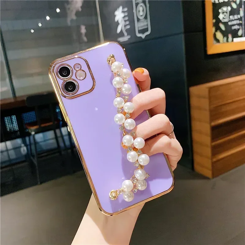 thumbnail image 1 of Funda blanda con cadena y pulsera de perlas chapadas de lujo para iPhone 15, 13, 14, 12 Pro Max, 11, XS, X, XR, 7, 8 Plus, mini SE, funda de silicona con purpurina, 1 of 5
