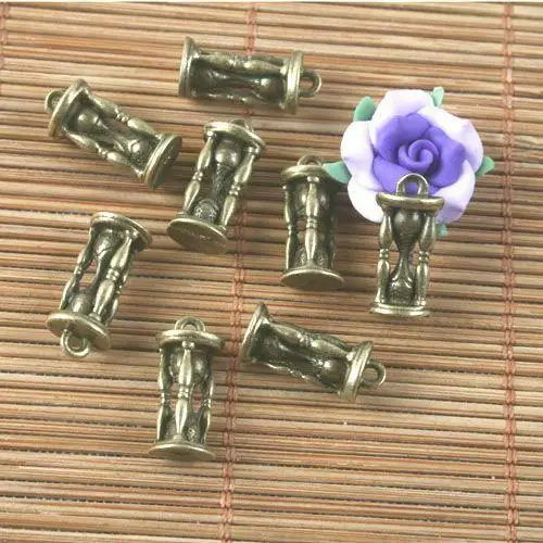 

14pcs 15x6mm,hole:0.5mm antiqued bronze sandglass design charms G1601