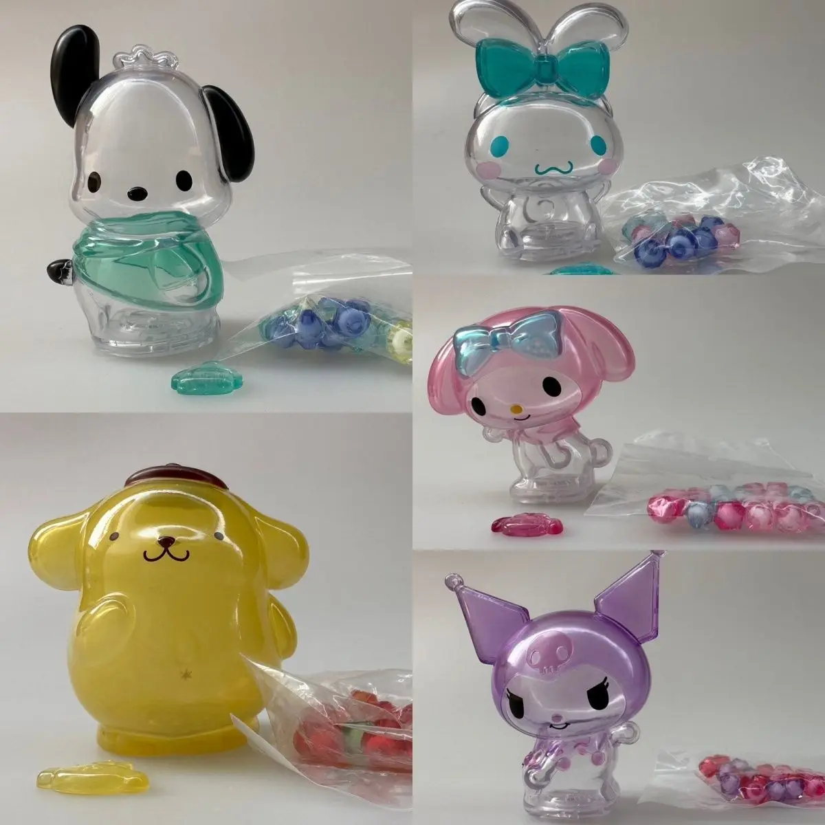 

Sanrio Anime Cartoon Anime Figure Cartoon Cinnamoroll Kuromi Melody Kawaii Action Figure Transparent Candy Jar Ornament Gift