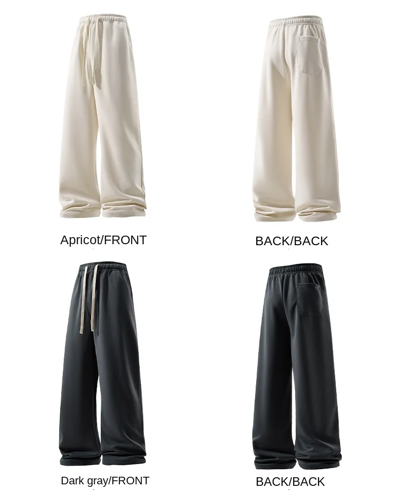 Man wearing loose wide-leg sweatpants with drawstring waist in a casual autumn streetwear setting gray beige