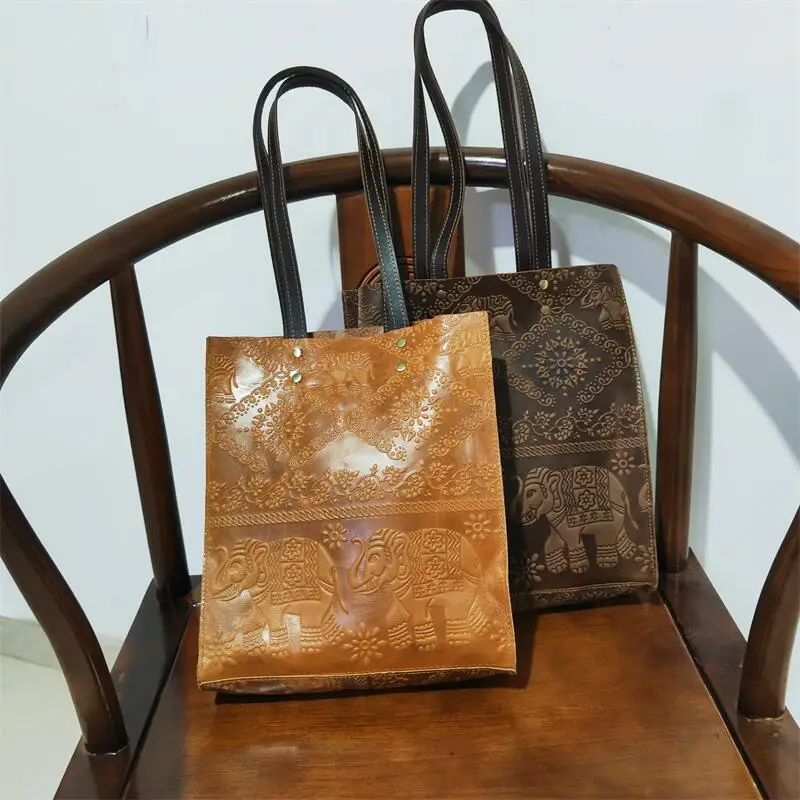 

Fashion cowhide retro embossed genuine leather personalized women's bag