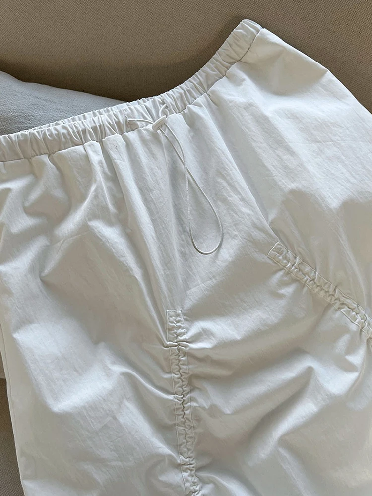 [EAM] High Elastic Waist White Drawstring Irregular Casual Half-body Skirt Women Fashion Tide New Spring Autumn 2026 1DH9428